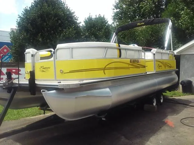 Yellow Bentley pontoon boat cleaned up by Grindtime Mobile Detailing