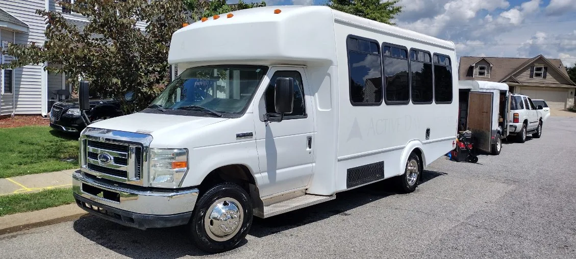 Active Day shuttle bus detailed on site by Grindtime