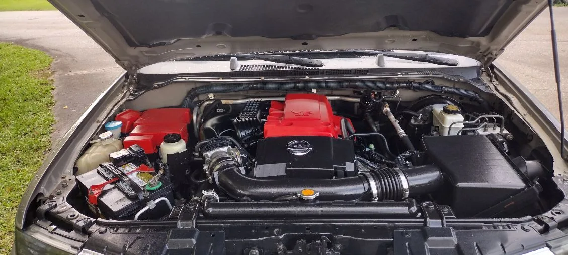 Nissan engine bay cleaned and dressed by Grindtime Mobile Detailing